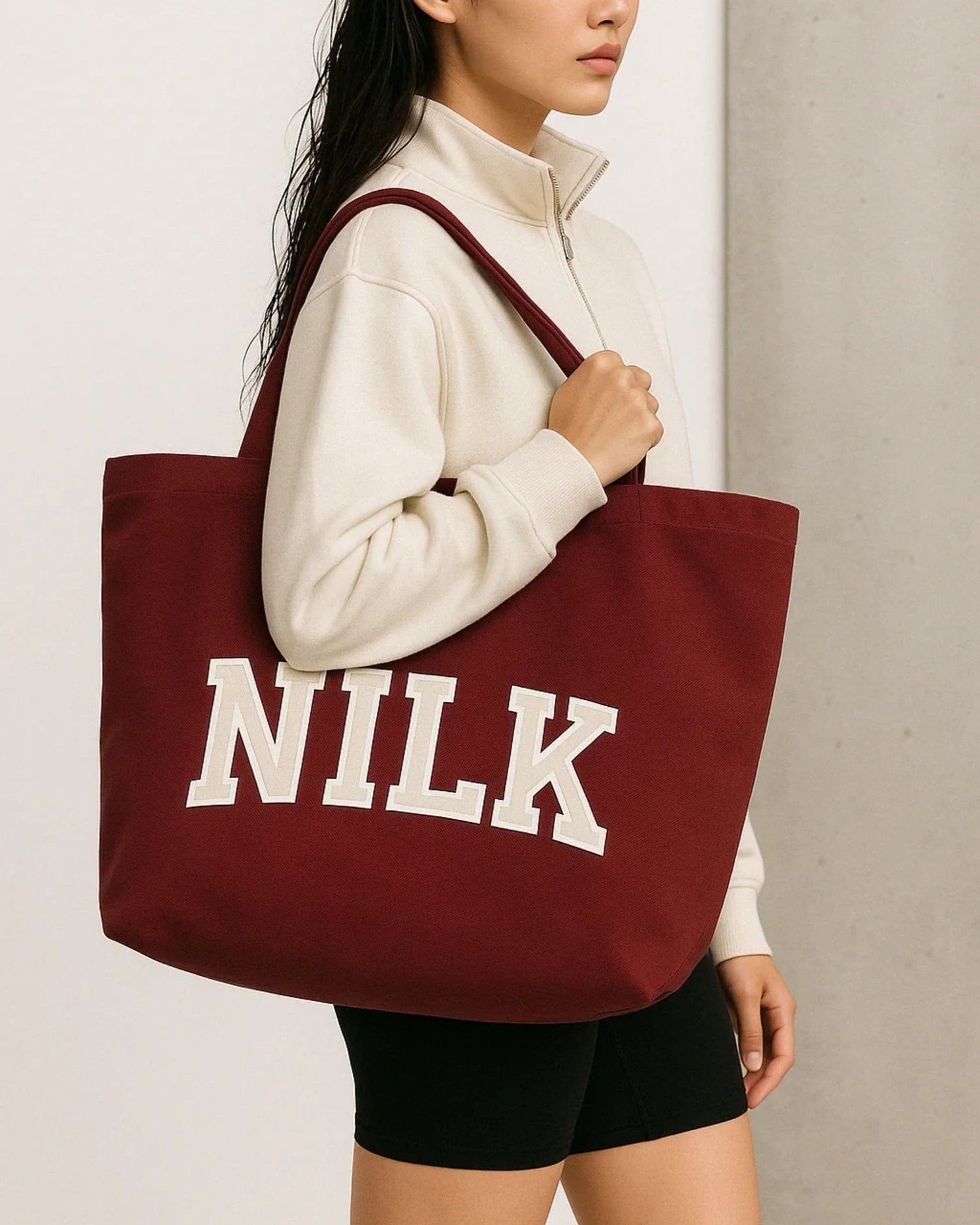 Maroon Dream Team NILK large canvas tote bag with bold white varsity lettering – zippered shoulder tote for gym, errands or weekend carry