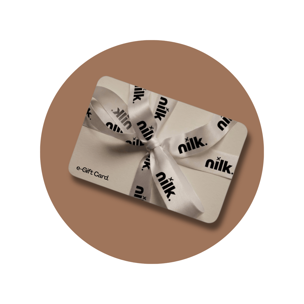 NILK digital pickleball gift card featuring an elegant cream gift card with branded satin ribbon, displayed against a warm brown circular background.