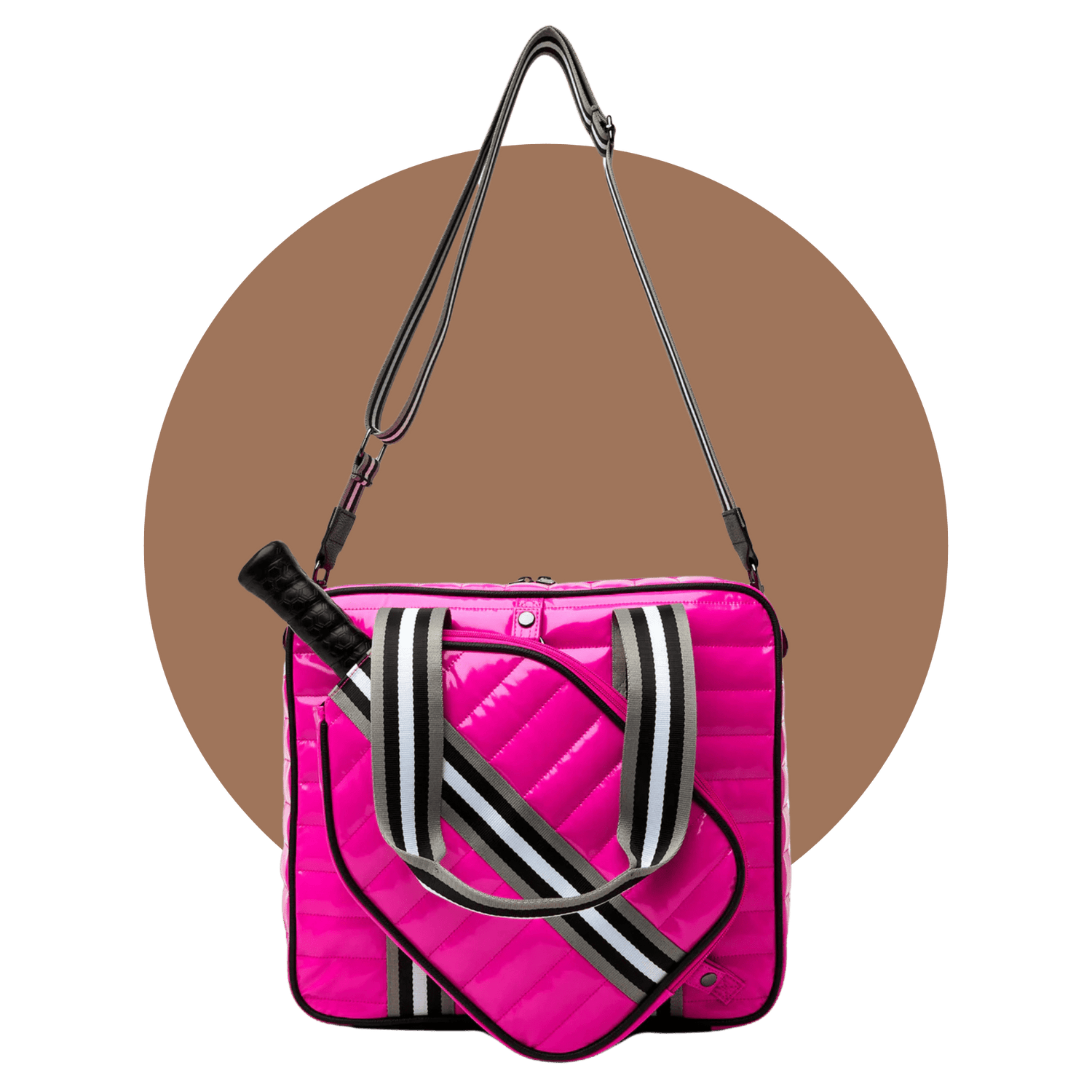 Pink NILK pickleball bag with paddle in holder — best pickleball bag for women with top handles and luxe nylon straps.