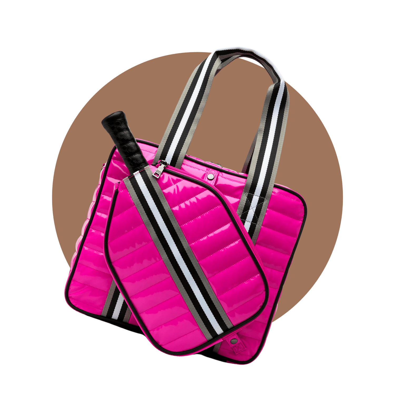 Pink puffer pickleball tote bag with paddle inside cover — stylish pickleball bag for women with bold color and quilted design.