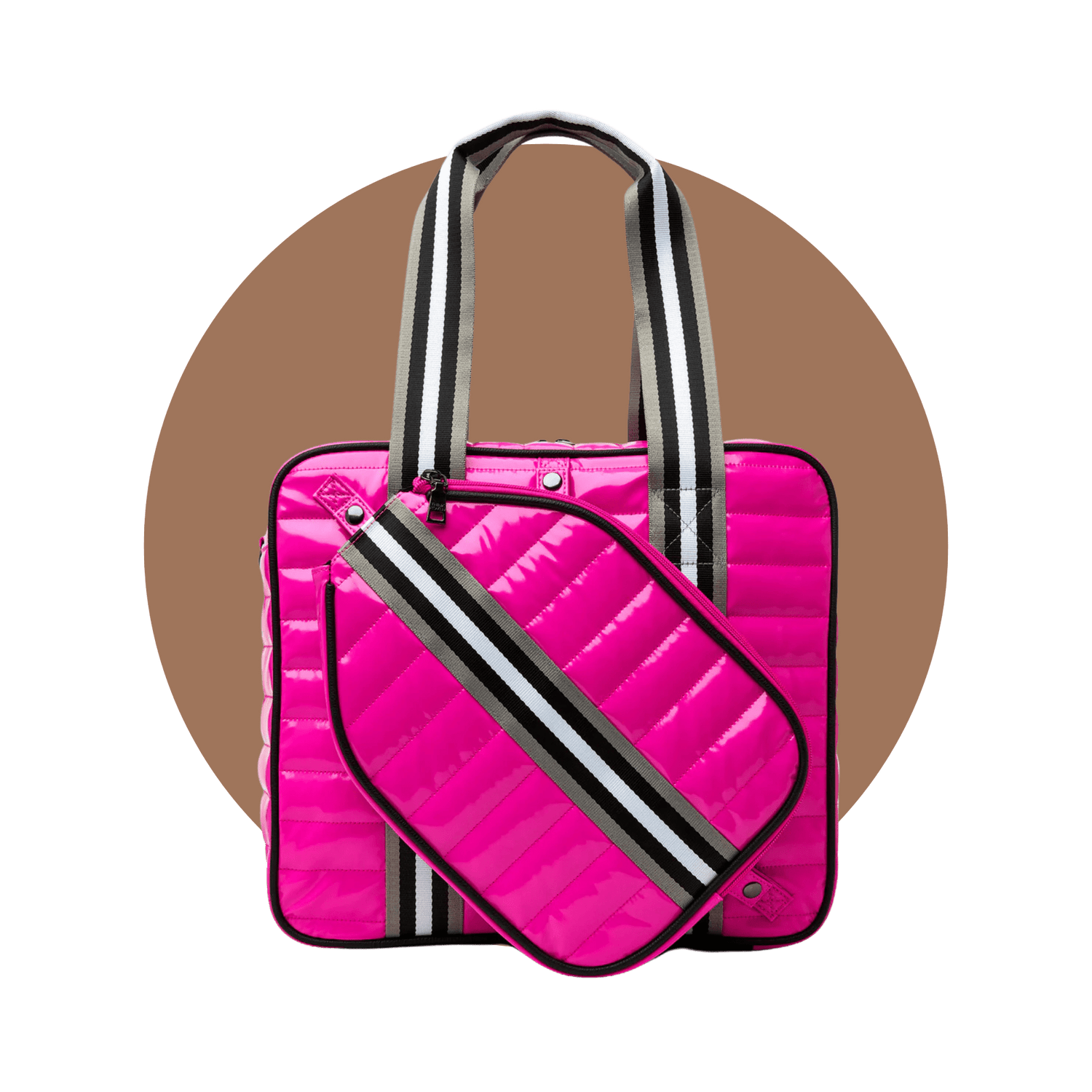 Pink quilted pickleball bag with integrated paddle cover — best pickleball bag for women with striped handles and stylish storage.