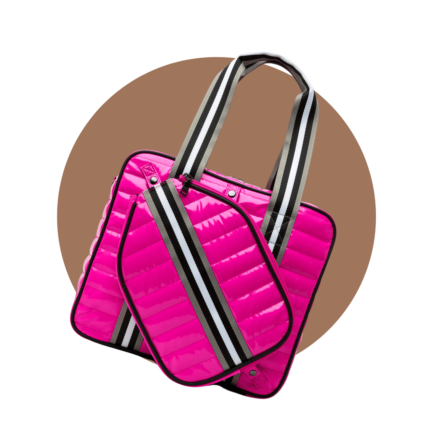 Angled front view of pink pickleball tote — padded puffer pickleball bag with exterior paddle holder and striped handles.